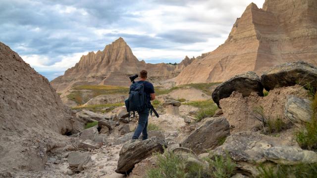 Photographer walking in the Badlands