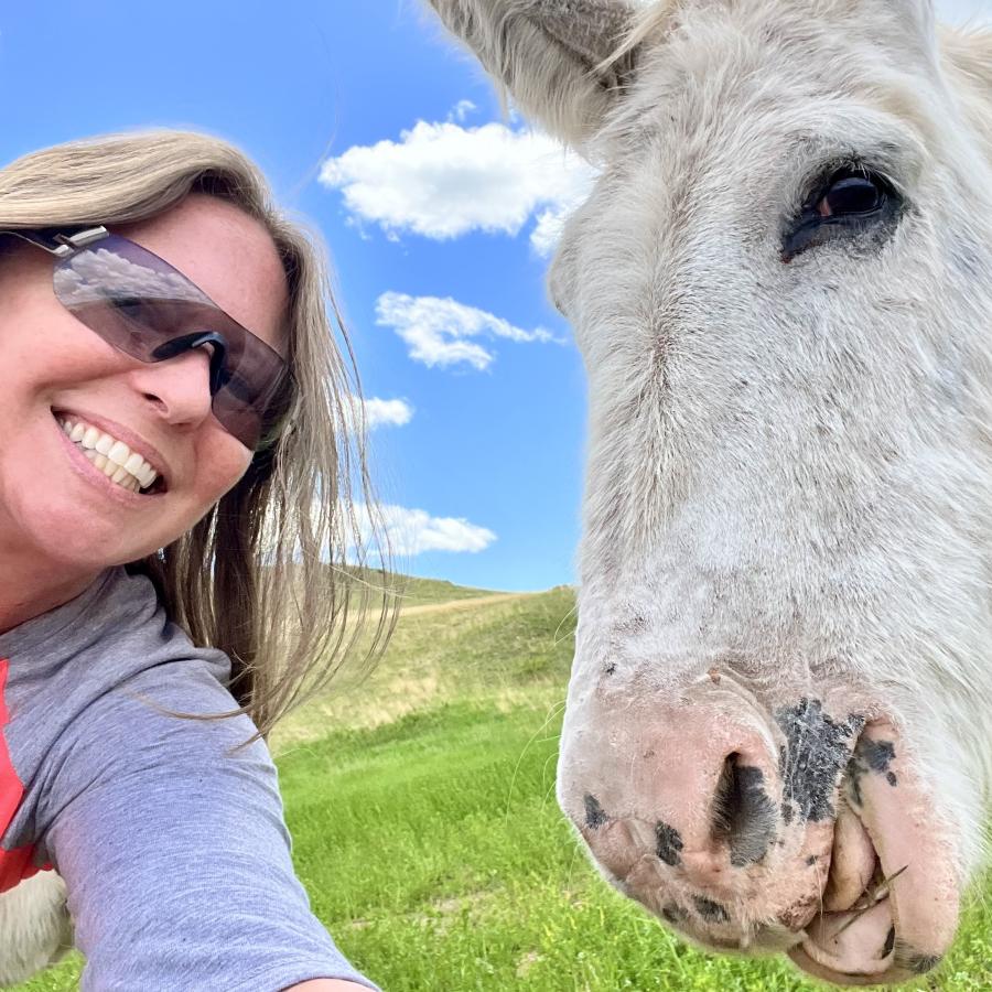 Woman and Burro taking a selfie